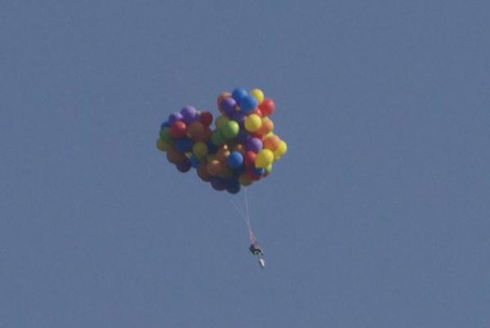 Man Arrested After Flying Over Canadian City In Balloon Chair